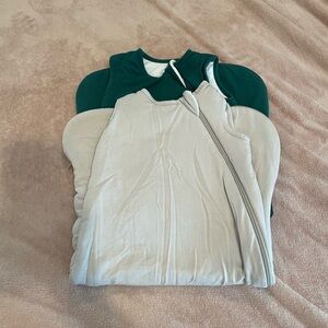 Gently pre-loved size Small, 1 Tog Kyte sleep sacks  (1 Emerald + 1 Oat)
